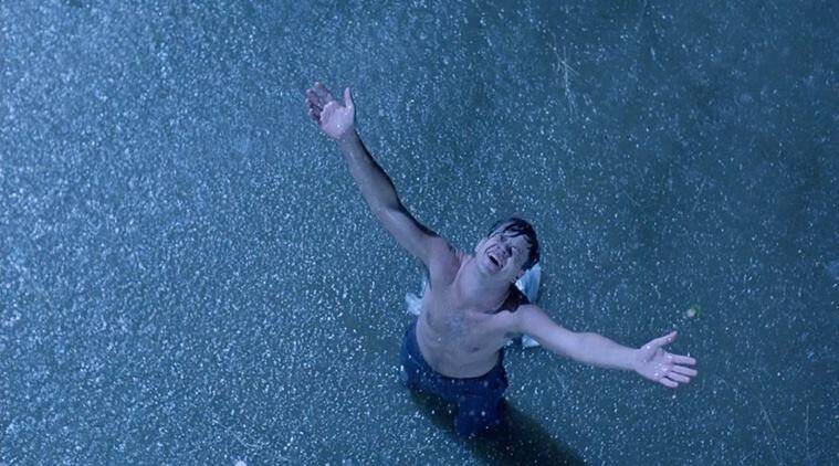 andy dufresne from the movie shawshank redemption in the climax of the movie, escaping the